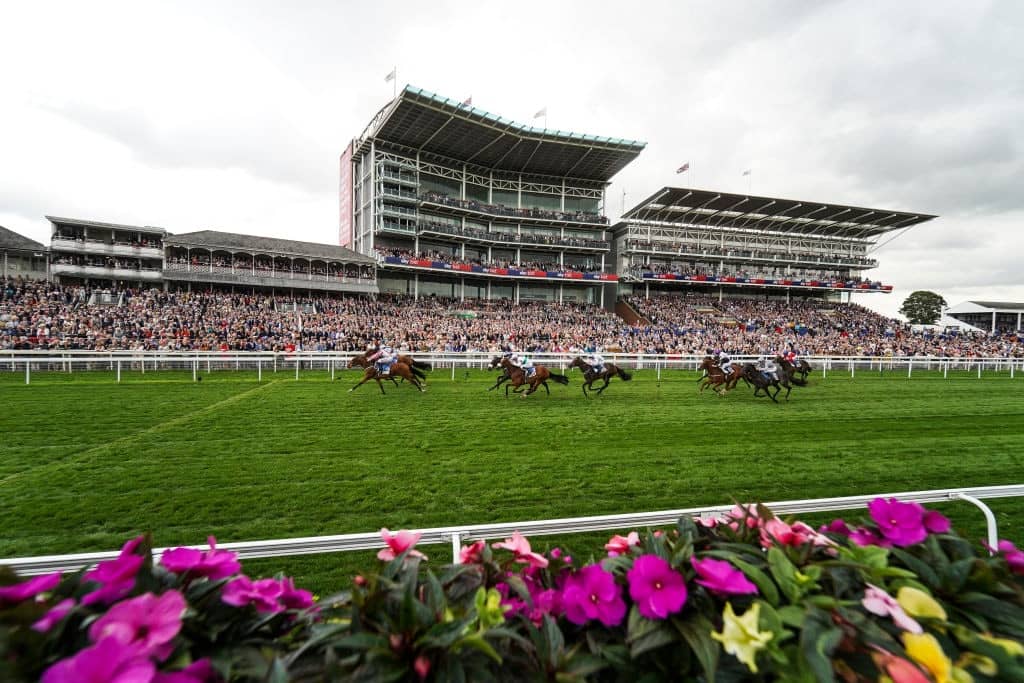 YORK, ENGLAND - AUGUST 23: A general view as runners race towards the finish at York Racecourse on August 23, 2018 in York, United Kingdom. (Photo by Alan Crowhurst/Getty Images)