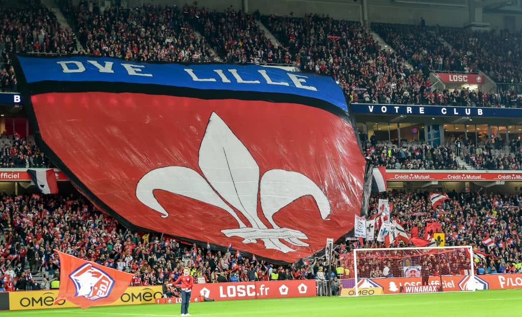 Lille's fan cheer ahead of the French L1 football match Lille (LOSC) vs Olympique de Marseille (OM) on September 30 2018 at the " Pierre Mauroy " stadium in Villeneuve-d'Ascq northern France. (Photo by PHILIPPE HUGUEN / AFP) (Photo credit should read PHILIPPE HUGUEN/AFP/Getty Images)