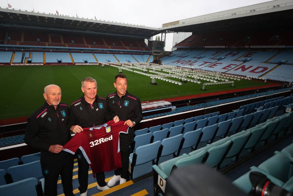 BIRMINGHAM, ENGLAND - OCTOBER 15: Richard O'Kelly Assistant head coach, Dean Smith manager and John Terry assistant manager of Aston Villa during a press conference at Villa Park Stadium on October 15, 2018 in Birmingham, England. (Photo by Catherine Ivill/Getty Images)