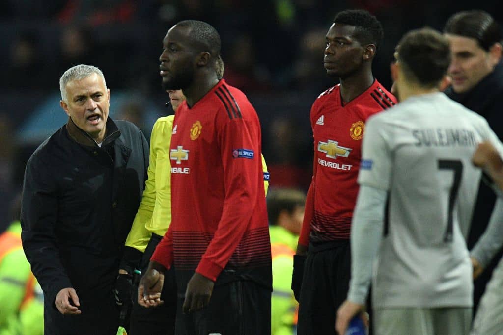 Manchester United's Portuguese manager Jose Mourinho (L) shouts instructions at Manchester United's Belgian striker Romelu Lukaku as he is substituted on with Manchester United's French midfielder Paul Pogba during the UEFA Champions League group H football match between Manchester United and Young Boys at Old Trafford in Manchester, north-west England on November 27, 2018. (Photo by Oli SCARFF / AFP) (Photo credit should read OLI SCARFF/AFP via Getty Images)