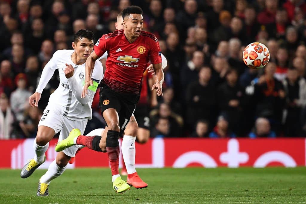 Paris Saint-Germain's Brazilian defender Thiago Silva (L) chases Manchester United's English midfielder Jesse Lingard during the first leg of the UEFA Champions League round of 16 football match between Manchester United and Paris Saint-Germain (PSG) at Old Trafford in Manchester, north-west England on February 12, 2019. (Photo by FRANCK FIFE / AFP) (Photo credit should read FRANCK FIFE/AFP/Getty Images)