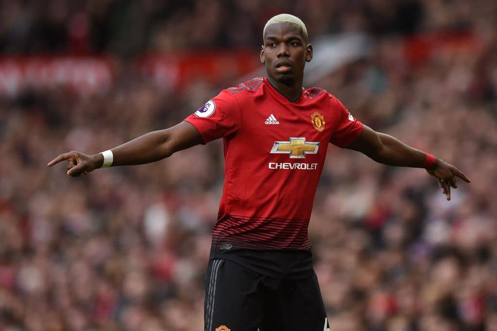 TOPSHOT - Manchester United's French midfielder Paul Pogba gestures during the English Premier League football match between Manchester United and Southampton at Old Trafford in Manchester, north west England, on March 2, 2019. (Photo by Oli SCARFF / AFP) / RESTRICTED TO EDITORIAL USE. No use with unauthorized audio, video, data, fixture lists, club/league logos or 'live' services. Online in-match use limited to 120 images. An additional 40 images may be used in extra time. No video emulation. Social media in-match use limited to 120 images. An additional 40 images may be used in extra time. No use in betting publications, games or single club/league/player publications. / (Photo credit should read OLI SCARFF/AFP/Getty Images)
