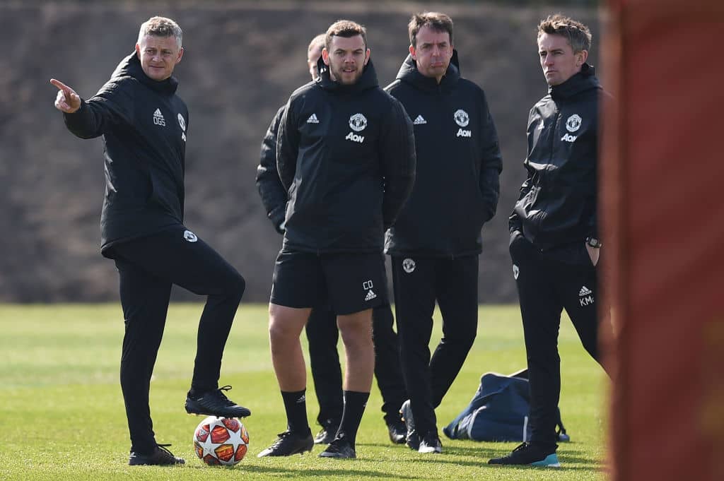 Manchester United's Norwegian manager Ole Gunnar Solskjaer (L) and players attend a training session at the Carrington training ground in greater Manchester, north west England on April 9, 2019, on the eve of their UEFA Champions League quarter final first leg football match against Barcelona. (Photo by Oli SCARFF / AFP) (Photo by OLI SCARFF/AFP via Getty Images)