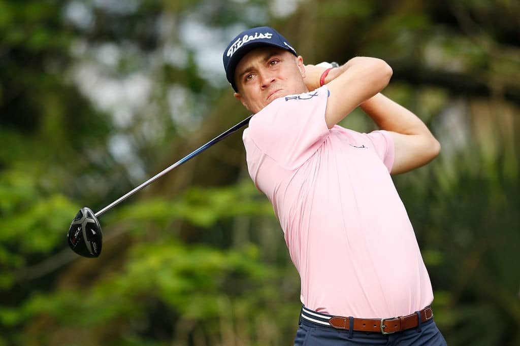 PONTE VEDRA BEACH, FLORIDA - MARCH 16: Justin Thomas of the United States plays his shot from the fifth tee during the third round of The PLAYERS Championship on The Stadium Course at TPC Sawgrass on March 16, 2019 in Ponte Vedra Beach, Florida. (Photo by Michael Reaves/Getty Images)