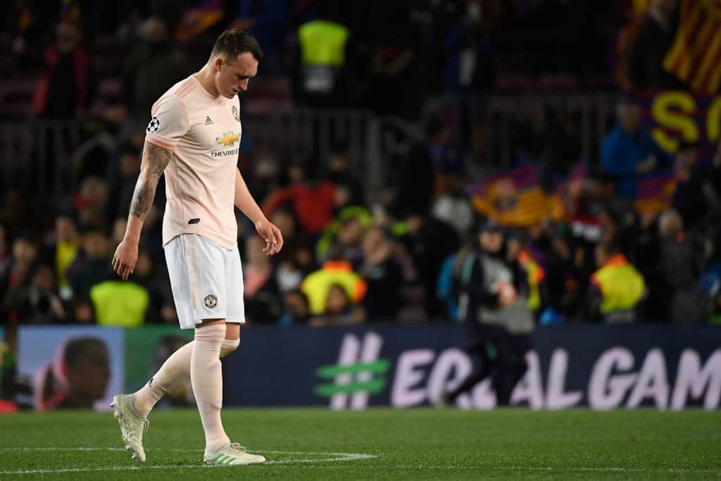 Manchester United's English defender Phil Jones leaves the pitch at the end of the UEFA Champions League quarter-final second leg football match between Barcelona and Manchester United at the Camp Nou stadium in Barcelona on April 16, 2019. (Photo by LLUIS GENE / AFP) (Photo credit should read LLUIS GENE/AFP/Getty Images)