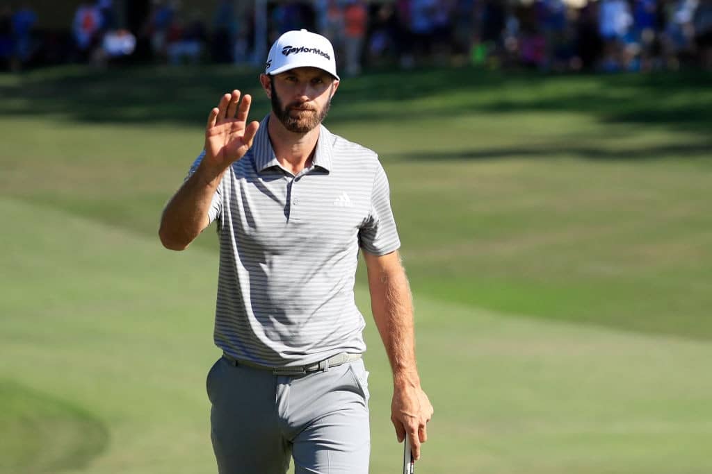 PALM HARBOR, FLORIDA - MARCH 23: Dustin Johnson of the United States reacts to his birdie on the 14th green during the third round of the Valspar Championship on the Copperhead course at Innisbrook Golf Resort on March 23, 2019 in Palm Harbor, Florida. (Photo by Cliff Hawkins/Getty Images)