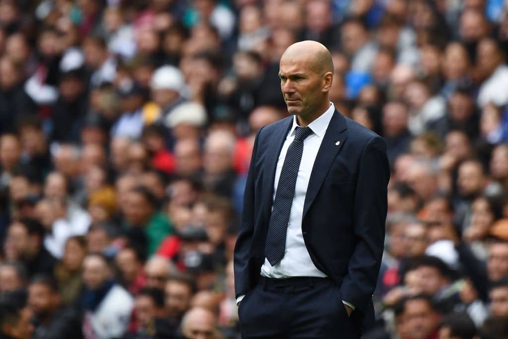 Real Madrid's French coach Zinedine Zidane observes players during the Spanish League football match between Real Madrid and Athletic Bilbao at the Santiago Bernabeu Stadium in Madrid on April 21, 2019. (Photo by GABRIEL BOUYS / AFP) (Photo credit should read GABRIEL BOUYS/AFP/Getty Images)
