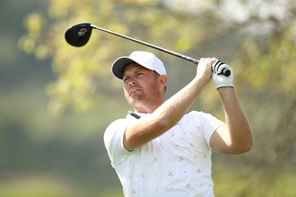 AUSTIN, TEXAS - MARCH 27: Tom Lewis of England plays his shot from the sixth tee in his match against Brooks Koepka of the United States during the first round of the World Golf Championships-Dell Technologies Match Play at Austin Country Club on March 27, 2019 in Austin, Texas. (Photo by Ezra Shaw/Getty Images)