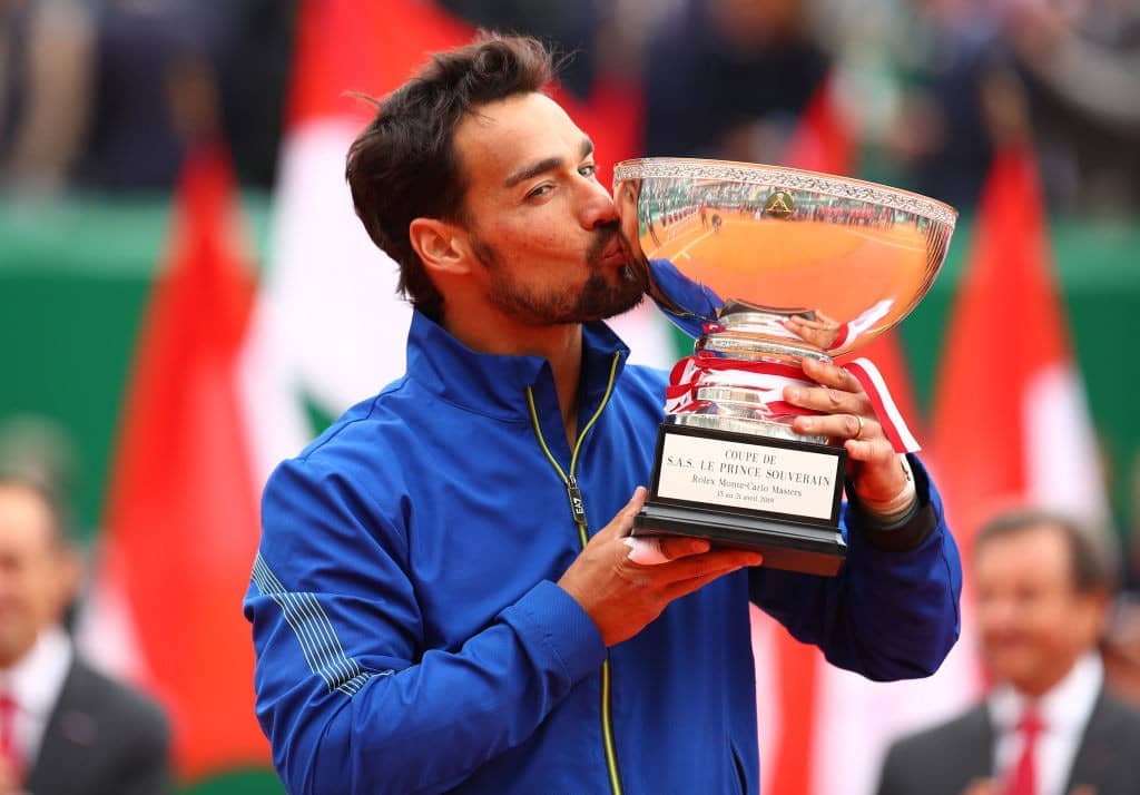 MONTE-CARLO, MONACO - APRIL 21: Fabio Fognini of Italy kisses the winners trophy after his straight sets victory against Dusan Lajovic of Serbia in the men's singles final during day eight of the Rolex Monte-Carlo Masters at Monte-Carlo Country Club on April 21, 2019 in Monte-Carlo, Monaco. (Photo by Clive Brunskill/Getty Images)
