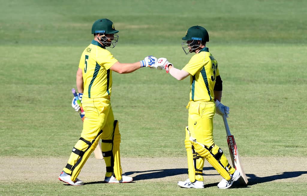 BRISBANE, AUSTRALIA - MAY 06: Aaron Finch and David Warner of Australia pump fists during the Cricket World Cup One Day Practice Match between Australia and New Zealand at Allan Border Field on May 06, 2019 in Brisbane, Australia. (Photo by Bradley Kanaris/Getty Images)