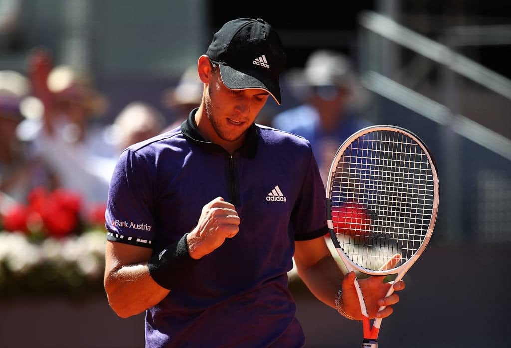 MADRID, SPAIN - MAY 11: Dominic Thiem of Austria celebrates a point against Novak Djokovic of Serbia during day eight of the Mutua Madrid Open at La Caja Magica on May 11, 2019 in Madrid, Spain. (Photo by Julian Finney/Getty Images)