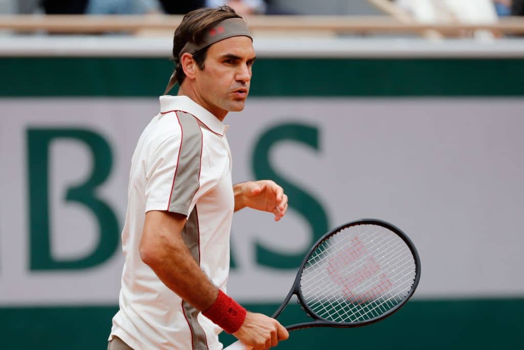 Switzerland's Roger Federer reacts as he plays against Spain's Rafael Nadal during their men's singles semi-final match on day 13 of The Roland Garros 2019 French Open tennis tournament in Paris on June 7, 2019. (Photo by Thomas SAMSON / AFP) (Photo credit should read THOMAS SAMSON/AFP/Getty Images)