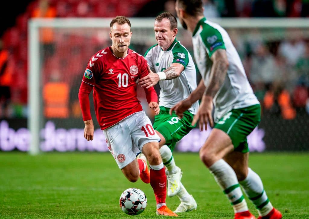 Denmark's Christian Eriksen (L) vies with Ireland's Glenn Whelan during the UEFA Euro 2020 qualifying football match between Denmark and Ireland in Telia Parken on June 7, 2019. (Photo by Liselotte Sabroe / Ritzau Scanpix / AFP) / Denmark OUT (Photo credit should read LISELOTTE SABROE/AFP/Getty Images)
