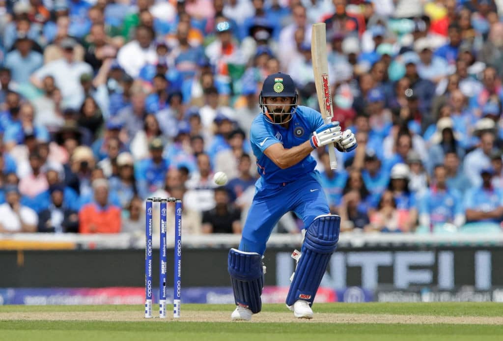 LONDON, ENGLAND - JUNE 09: Virat Kohli of India plays a shot during the Group Stage match of the ICC Cricket World Cup 2019 between India and Australia at The Oval on June 9, 2019 in London, England. (Photo by Henry Browne/Getty Images)