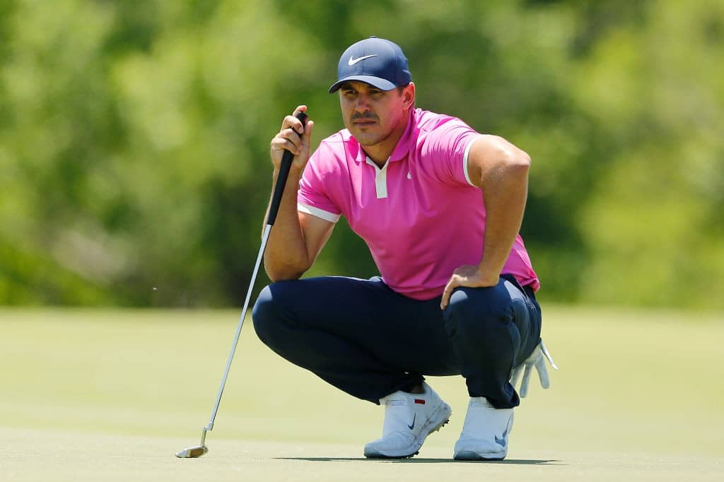 DALLAS, TEXAS - MAY 12: Brooks Koepka of the United States looks over a putt on the fourth green during the final round of the AT&T Byron Nelson at Trinity Forest Golf Club on May 12, 2019 in Dallas, Texas. (Photo by Michael Reaves/Getty Images)