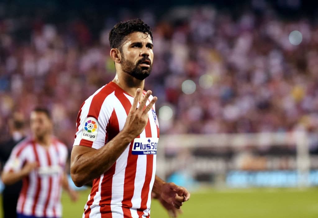 Atletico Madrid's Diego Costa celebrates after scoring his third goal during the 2019 International Champions Cup football match between Real Madrid and Atletico Madrid at the Metlife Stadium Arena in East Rutherford, New Jersey on July 26, 2019. (Photo by Johannes EISELE / AFP) (Photo credit should read JOHANNES EISELE/AFP/Getty Images)