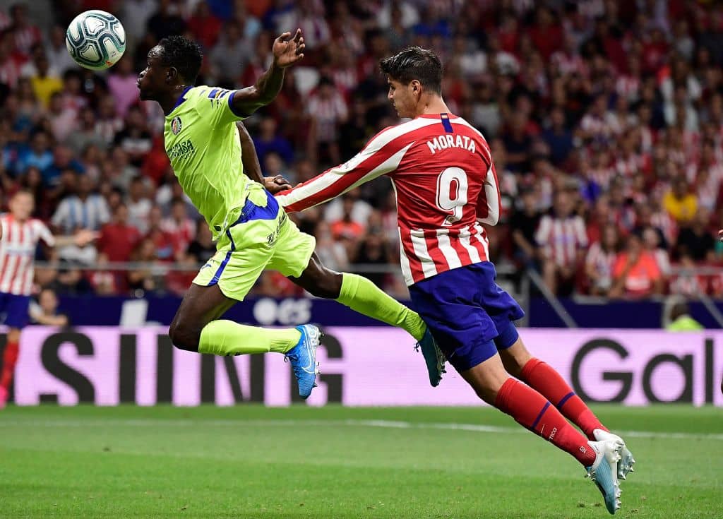 Atletico Madrid's Spanish forward Alvaro Morata (R) scores a header past Getafe's Togolese defender Dakonam Djene during the Spanish League football match between Atletico Madrid and Getafe at the Wanda Metropolitan Stadium in Madrid on August 18, 2019. (Photo by JAVIER SORIANO / AFP) (Photo credit should read JAVIER SORIANO/AFP/Getty Images) new signings