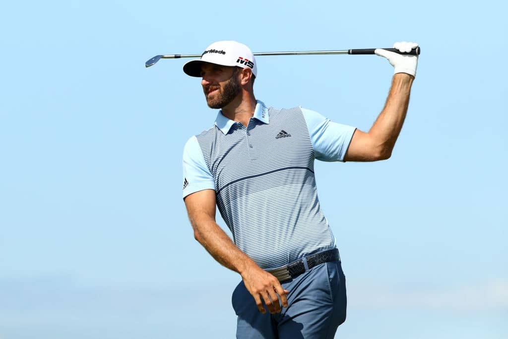 PORTRUSH, NORTHERN IRELAND - JULY 20: Dustin Johnson of the United States plays his shot from the sixth tee during the third round of the 148th Open Championship held on the Dunluce Links at Royal Portrush Golf Club on July 20, 2019 in Portrush, United Kingdom. (Photo by Francois Nel/Getty Images)