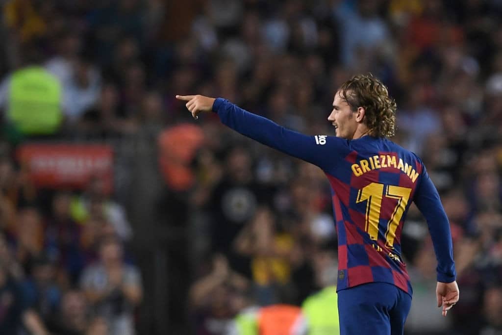 Barcelona's French forward Antoine Griezmann celebrates after scoring during the Spanish League football match between Barcelona and Real Betis at the Camp Nou stadium in Barcelona on August 25, 2019. (Photo by Josep LAGO / AFP) (Photo credit should read JOSEP LAGO/AFP/Getty Images)
