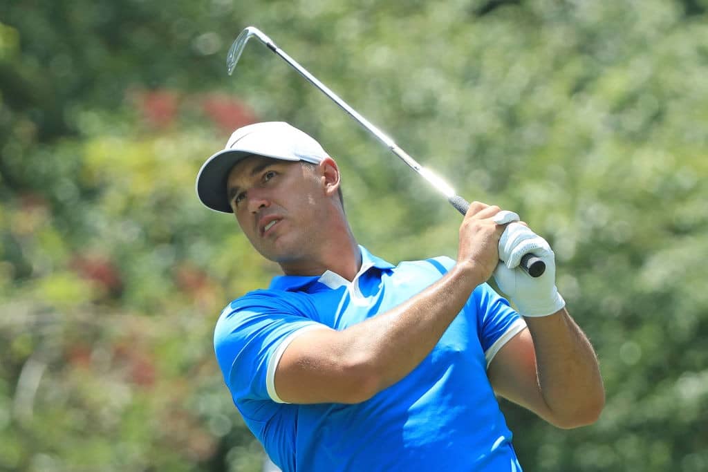 MEMPHIS, TENNESSEE - JULY 28: Brooks Koepka watches his tee shot on the fourth hole during the final round of the World Golf Championship-FedEx St Jude Invitational at TPC Southwind on July 28, 2019 in Memphis, Tennessee. (Photo by Sam Greenwood/Getty Images)