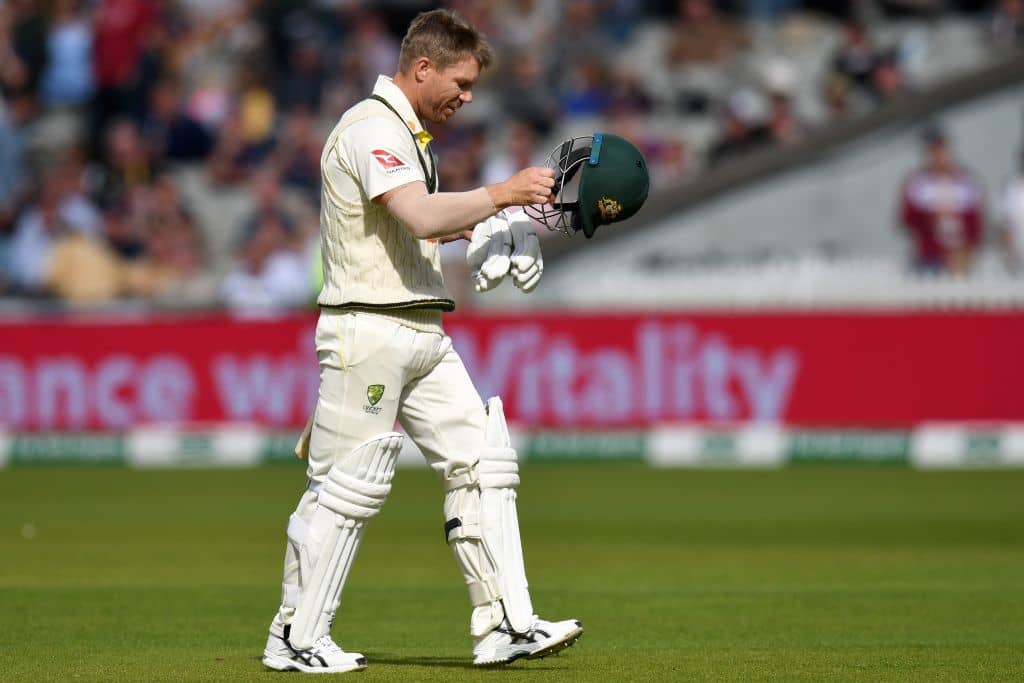 Australia's David Warner walks back to the pavilion after losing his wicket for no runs during the fourth day of the fourth Ashes cricket Test match between England and Australia at Old Trafford in Manchester, north-west England on September 7, 2019. (Photo by Oli SCARFF / AFP) / RESTRICTED TO EDITORIAL USE. NO ASSOCIATION WITH DIRECT COMPETITOR OF SPONSOR, PARTNER, OR SUPPLIER OF THE ECB (Photo credit should read OLI SCARFF/AFP/Getty Images)