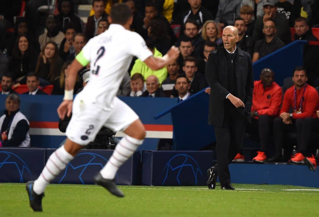 Real Madrid's French coach Zinedine Zidane reacts during the UEFA Champions league Group A football match between Paris Saint-Germain and Real Madrid, at the Parc des Princes stadium, in Paris, on September 18, 2019. (Photo by Lucas BARIOULET / AFP) (Photo credit should read LUCAS BARIOULET/AFP/Getty Images)