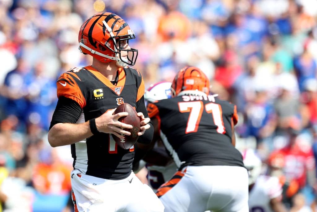 ORCHARD PARK, NEW YORK - SEPTEMBER 22: Andy Dalton #14 of the Cincinnati Bengals hold the ball during a game against the Buffalo Bills at New Era Field on September 22, 2019 in Orchard Park, New York. (Photo by Bryan M. Bennett/Getty Images)