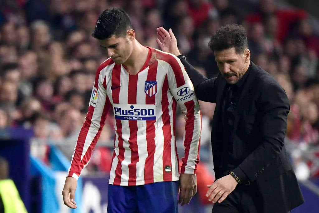 Atletico Madrid's Argentinian coach Diego Simeone congratulates Atletico Madrid's Spanish forward Alvaro Morata as he leaves the pitch during the Spanish league football match between Club Atletico de Madrid and Athletic Club Bilbao at the Wanda Metropolitano stadium in Madrid on October 26, 2019. (Photo by JAVIER SORIANO / AFP) (Photo by JAVIER SORIANO/AFP via Getty Images)