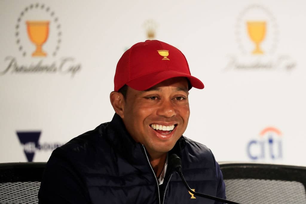 MELBOURNE, AUSTRALIA - DECEMBER 10: Tiger Woods of the United States team speaks to the media during a captains press conference with Ernie Els of the International team ahead of the 2019 Presidents Cup at the Royal Melbourne Golf Course on December 10, 2019 in Melbourne, Australia. (Photo by Cliff Hawkins/Getty Images)