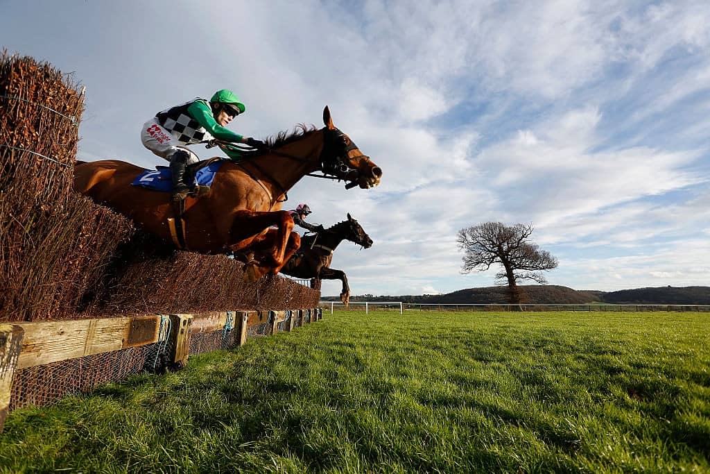 TAUNTON, ENGLAND - JANUARY 13: A general view of action in The Bathwick Tyres Handicap Steeple Chase at Taunton racecourse on January 13, 2016 in Taunton, England. (Photo by Alan Crowhurst/Getty Images)