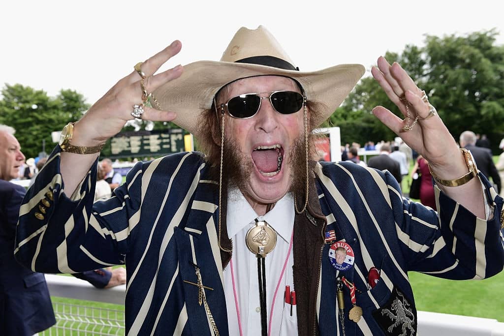 CHICHESTER, ENGLAND - JULY 27: John McCririck attends the Qatar Goodwood Festival 2016 at Goodwood on July 27, 2016 in Chichester, England. (Photo by Ian Gavan/Getty Images for The Goodwood Estate)