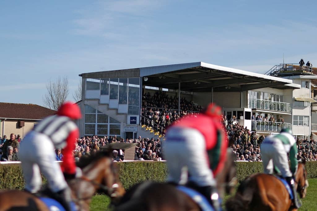 WINCANTON, ENGLAND - MARCH 09: A general view as runners pass the grandstands at Wincanton Racecourse on March 9, 2017 in Wincanton, England. (Photo by Alan Crowhurst/Getty Images)