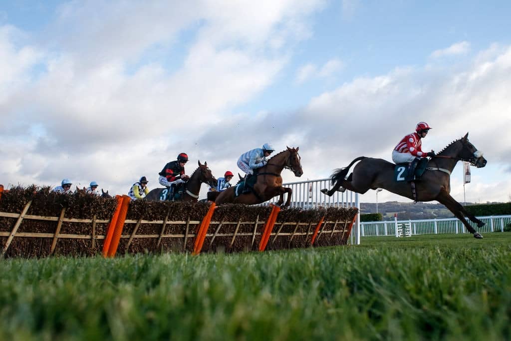 CHELTENHAM, ENGLAND - DECEMBER 15: A general view as runners clear a flight of hurdles at Cheltenham racecourse on December 15, 2017 in Cheltenham, United Kingdom. (Photo by Alan Crowhurst/Getty Images)