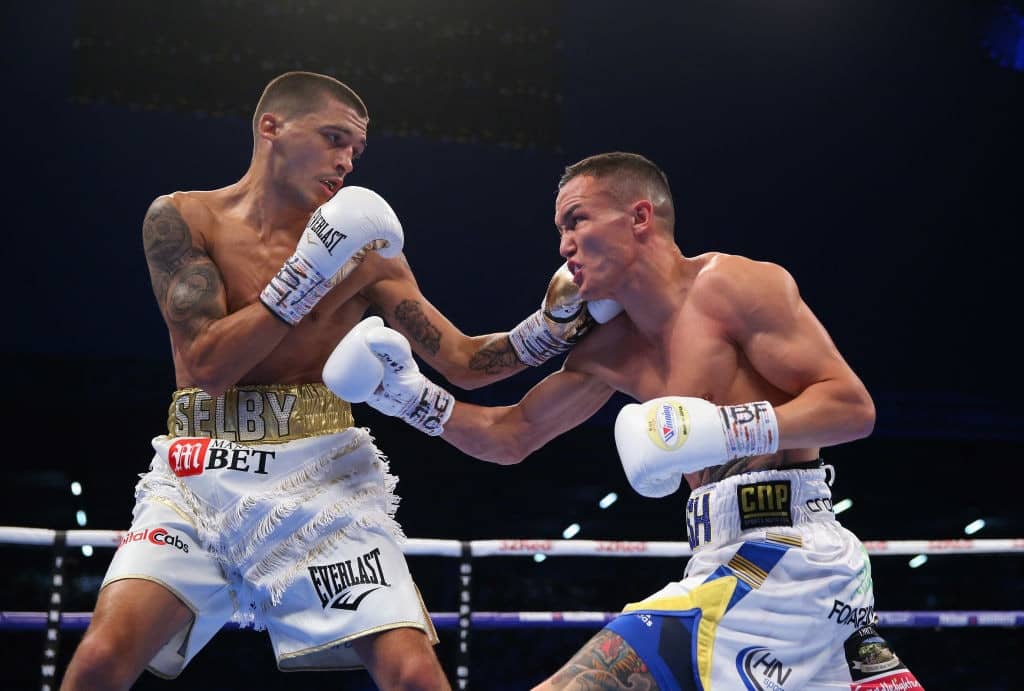 LEEDS, ENGLAND - MAY 19: Lee Selby and Josh Warrington trade punches during IBF Featherweight Championship fight at Elland Road on May 19, 2018 in Leeds, England. (Photo by Alex Livesey/Getty Images)