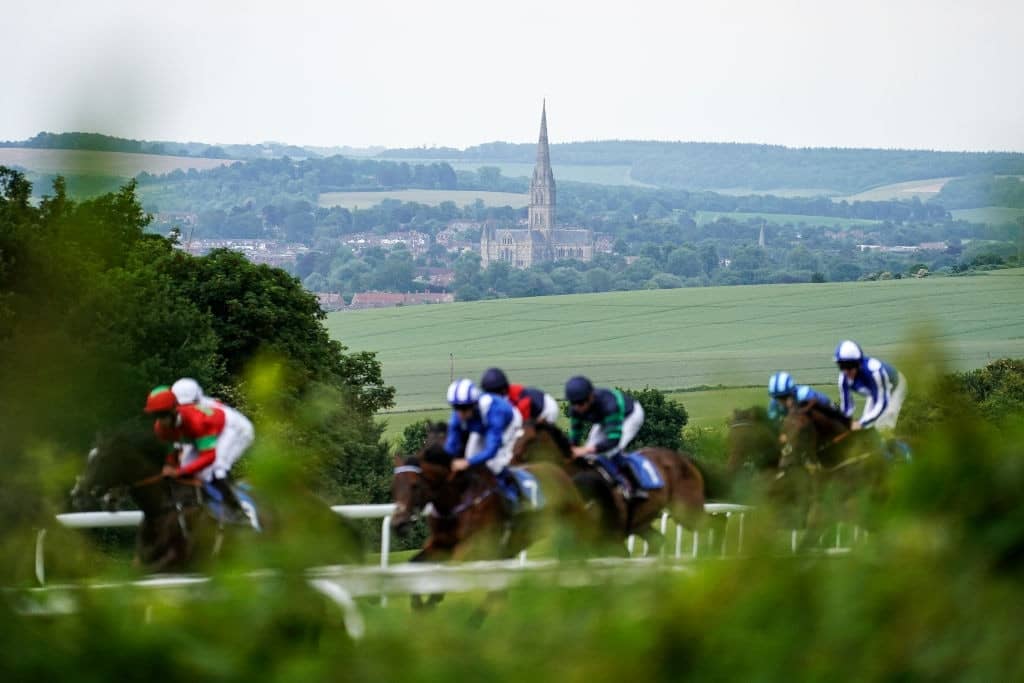 SALISBURY, ENGLAND - JUNE 12: A general view of the cathedral in the distance as runners make their way up the course at Salisbury Racecourse on June 12, 2018 in Salisbury, United Kingdom. (Photo by Alan Crowhurst/Getty Images)